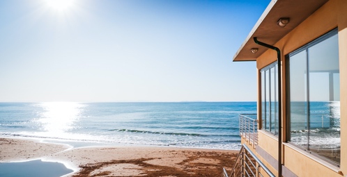 beach view of impact hurricane coastal windows
